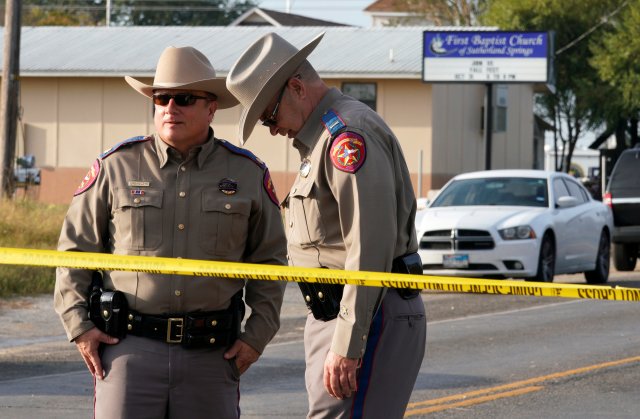 Police stand outside the site of a shooting at the First Baptist Church of Sutherland Springs, Texas, U.S. November 6, 2017.  REUTERS/Rick Wilking