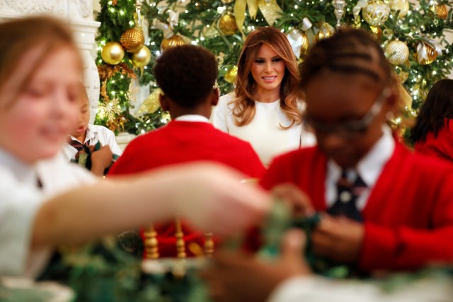 U.S. First Lady Melania Trump greets school children as she tours the holiday decorations with reporters at the White House in Washington, U.S. November 27, 2017.  REUTERS/Jonathan Ernst