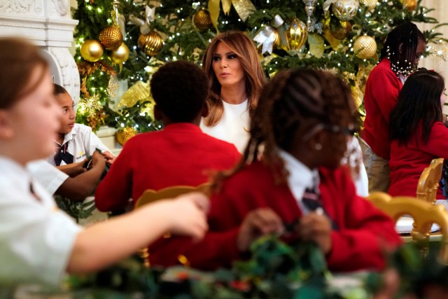 U.S. First Lady Melania Trump greets schoolchildren as she tours the holiday decorations with reporters at the White House in Washington, U.S., November 27, 2017. REUTERS/Jonathan Ernst