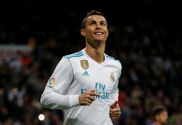 Soccer Football - La Liga Santander - Real Madrid vs Malaga - Santiago Bernabeu, Madrid, Spain - November 25, 2017 Real Madrid’s Cristiano Ronaldo celebrates scoring their third goal REUTERS/Javier Barbancho