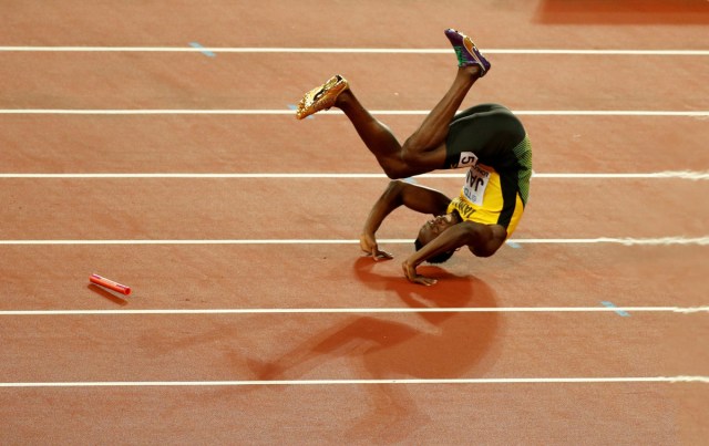Usain Bolt of Jamaica falls down injured in the Men's 4 X 100 meters relay final during the World Athletics Championships at London Stadium, London, Britain, August 12, 2017. REUTERS/Matthew Childs/File Photo  SEARCH "POY SPORT" FOR THIS STORY. SEARCH "REUTERS POY" FOR ALL BEST OF 2017 PACKAGES.    TPX IMAGES OF THE DAY