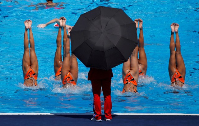 North Korea's synchronised swimming team practice under coach supervision during the World Aquatics Championships, Team Technical Final in Budapest, Hungary, July 18, 2017. REUTERS/Stefan Wermuth/File Photo  SEARCH "POY SPORT" FOR THIS STORY. SEARCH "REUTERS POY" FOR ALL BEST OF 2017 PACKAGES.    TPX IMAGES OF THE DAY