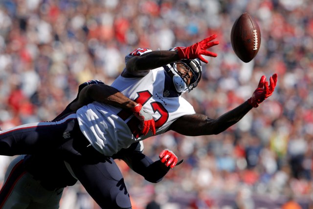 Houston Texans wide receiver Bruce Ellington (12) makes the catch under pressure from the New England Patriots defense in the second half at Gillette Stadium in Foxborough, MA, U.S., September 24, 2017. USA TODAY Sports/David Butler/File Photo  SEARCH "POY SPORT" FOR THIS STORY. SEARCH "REUTERS POY" FOR ALL BEST OF 2017 PACKAGES.    TPX IMAGES OF THE DAY