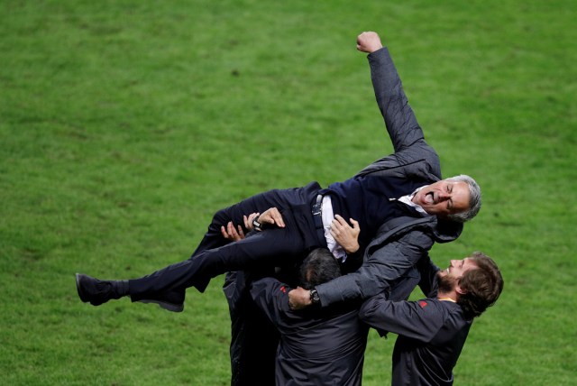 Manchester United manager Jose Mourinho celebrates with coaching staff after the UEFA Europa League Final match against Ajax Amsterdam at the Friends Arena, Solna, Stockholm, Sweden, May 5, 2017. Reuters/Phil Noble/File Photo  SEARCH "POY SPORT" FOR THIS STORY. SEARCH "REUTERS POY" FOR ALL BEST OF 2017 PACKAGES.    TPX IMAGES OF THE DAY