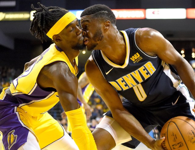 Los Angeles Lakers guard Briante Weber (12) comes face to face with Denver Nuggets guard Emmanuel Mudiay (0) under the basket in the second half of the game at Citizens Business Bank Arena in Ontario, CA, U.S., October 4, 2017. USA TODAY Sports/Jayne Kamin-Oncea/File Photo  SEARCH "POY SPORT" FOR THIS STORY. SEARCH "REUTERS POY" FOR ALL BEST OF 2017 PACKAGES.    TPX IMAGES OF THE DAY