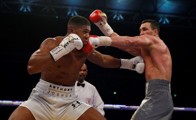 Boxers Anthony Joshua and Wladimir Klitschko in action during their bout for the IBF, IBO and WBA Super World Heavyweight Titles at Wembley Stadium, London, England, April 29, 2017. Action Images via Reuters/Andrew Couldridge/File Photo  SEARCH "POY SPORT" FOR THIS STORY. SEARCH "REUTERS POY" FOR ALL BEST OF 2017 PACKAGES.    TPX IMAGES OF THE DAY