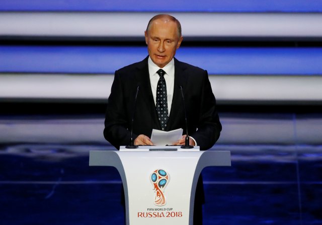 Soccer Football - 2018 FIFA World Cup Draw - State Kremlin Palace, Moscow, Russia - December 1, 2017 President of Russia Vladimir Putin during the draw REUTERS/Kai Pfaffenbach