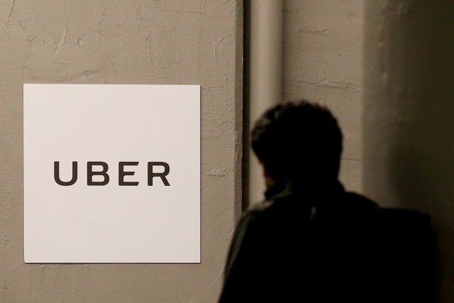 FILE PHOTO: A man arrives at the Uber offices in Queens, New York, U.S. on February 2, 2017.  REUTERS/Brendan McDermid/File Photo