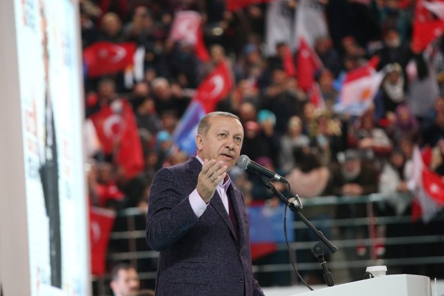 Turkish President Tayyip Erdogan addresses his supporters during a meeting of his ruling AK Party in Sivas, Turkey December 10, 2017. Yasin Bulbul/Presidential Palace/Handout via REUTERS ATTENTION EDITORS - THIS PICTURE WAS PROVIDED BY A THIRD PARTY. NO RESALES. NO ARCHIVE.