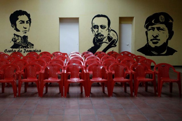 Empty chairs are seen at a polling station during a nationwide election for new mayors, in Caracas, Venezuela December 10, 2017. REUTERS/Marco Bello