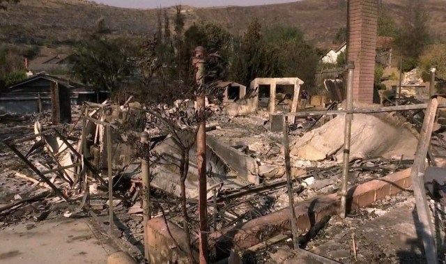 Debris and rubble remain where the house of Ventura Country Sheriff Commander Dave Murray once stood in Ventura, California, U.S. December 8, 2017. Picture taken December 8, 2017. REUTERS/Ben Gruber