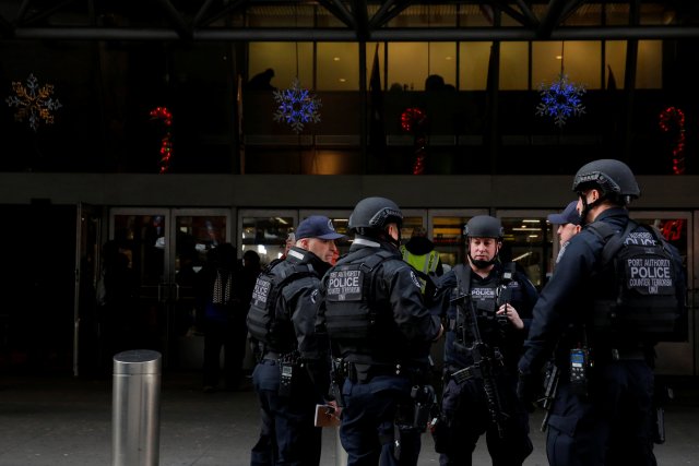 Members of the Port Authority Police Counter Terrorism Unit gather at the entrance of the New York Port Authority Bus Terminal following an attempted detonation during the morning rush hour, in New York City, New York, U.S., December 11, 2017 (REUTERS/Andrew Kelly)