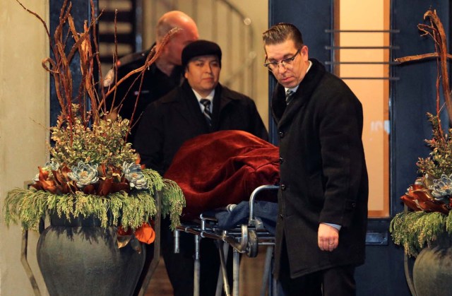 One of two bodies is removed from the home of billionaire founder of Canadian pharmaceutical firm Apotex Inc., Barry Sherman and his wife Honey, who were found dead under circumstances that police described as "suspicious" in Toronto, Ontario, Canada, December 15, 2017. REUTERS/Chris Helgren