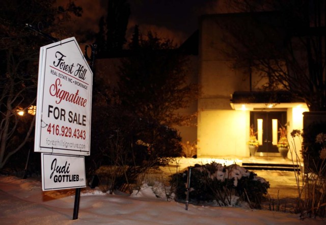 A For Sale sign stands outside the home of billionaire founder of Canadian pharmaceutical firm Apotex Inc., Barry Sherman and his wife Honey, who were found dead under circumstances that police described as "suspicious" in Toronto, Ontario, Canada, December 15, 2017. REUTERS/Chris Helgren
