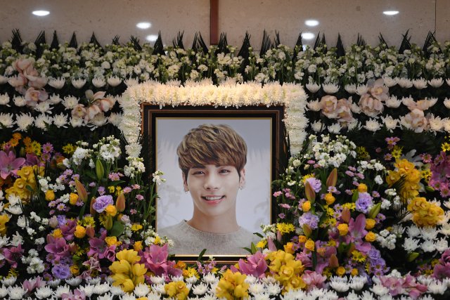 A portrait of Kim Jong-hyun, the lead singer of top South Korean boy band SHINee, is seen on an altar during a memorial service for him in Seoul, South Korea, December 19, 2017. Yonhap/via REUTERS ATTENTION EDITORS - THIS IMAGE HAS BEEN SUPPLIED BY A THIRD PARTY. SOUTH KOREA OUT. NO RESALES. NO ARCHIVE.