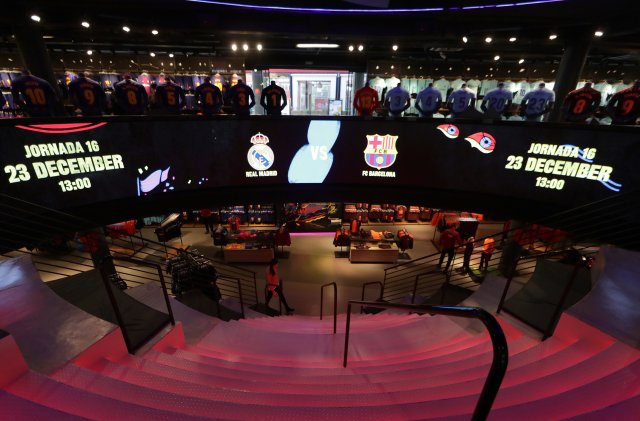 A sign at Barcelona Football Club store advertises the upcoming "Clasico" against Real Madrid at the Camp Nou in Barcelona, Spain, December 20, 2017. REUTERS/Eric Gaillard