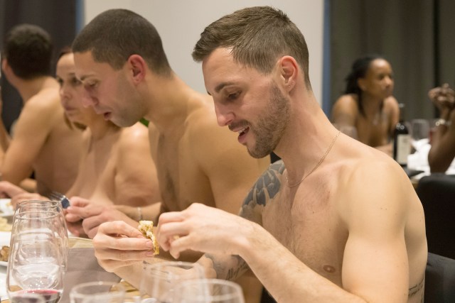 EDITORS NOTE: Graphic content / Diners eat in the nude at the newly opened nudist restaurant "o'naturel" in Paris on December 5, 2017. Leave your coats, your pants and your inhibitions at the door: a Paris restaurant has begun serving up classic French fare to diners in the nude. Located down a quiet side street in southwest Paris, O'naturel, billed as the French capital's first nudist restaurant, is the brainchild of 42-year-old twins Mike and Stephane Saada.  / AFP PHOTO / GEOFFROY VAN DER HASSELT / RESTRICTED TO EDITORIAL USE - TO ILLUSTRATE THE EVENT AS SPECIFIED IN THE CAPTION