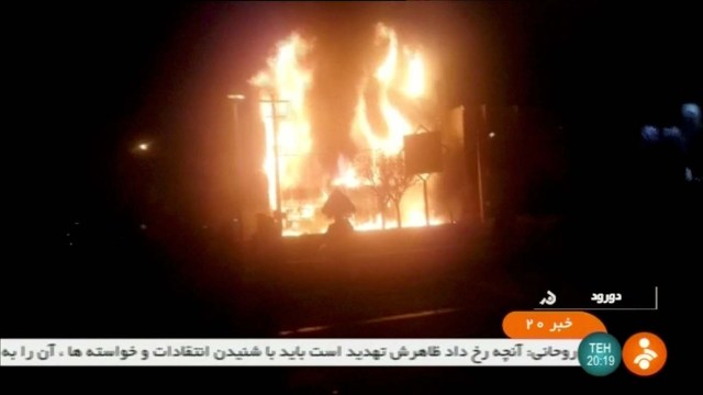 A building on fire is seen in Dorud, Iran, in this still image taken from video on December 31, 2017. IRINN/ReutersTV via REUTERS ATTENTION EDITORS - THIS IMAGE WAS PROVIDED BY A THIRD PARTY. IRAN OUT. NO RESALES. NO ARCHIVE.