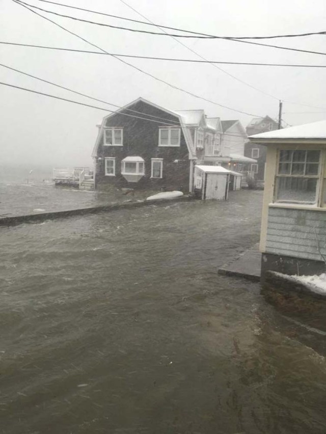 Flooded streets are seen in Scituate, Massachusetts, U.S. January 4, 2018 in this picture obtained from social media. Picture taken January 4, 2018. JILL PELO /via REUTERS THIS IMAGE HAS BEEN SUPPLIED BY A THIRD PARTY. MANDATORY CREDIT. NO RESALES. NO ARCHIVES
