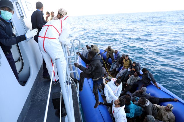 Migrants are rescued by Libyan coast guards off the coast of Garabulli, east of Tripoli, Libya, January 8, 2018. REUTERS/Hani Amara