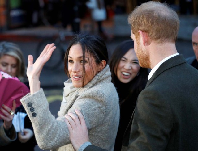 Britain's Prince Harry and his fiancee Meghan Markle greet well wishers as they leave after visiting radio station Reprezent FM, in Brixton, London January 9, 2018. REUTERS/Peter Nicholls