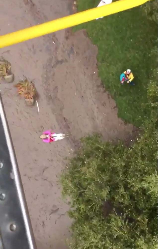 An aerial view from a Ventura Country Sheriff helicopter shows a person being lifted from a site damaged by mudslide in Carpinteria, California, U.S. January 9, 2018. Ventura County Sheriff's Office/via REUTERS THIS IMAGE HAS BEEN SUPPLIED BY A THIRD PARTY. MANDATORY CREDIT.NO RESALES. NO ARCHIVES