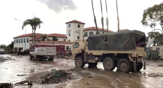 Military vehicles arrive to assist evacuation operations at an area damaged by mudslides in Montecito, California, U.S. January 9, 2018 in this photo obtained from social media. Santa Barbara County Fire Department/via REUTERS THIS IMAGE HAS BEEN SUPPLIED BY A THIRD PARTY. MANDATORY CREDIT. NO RESALES. NO ARCHIVES