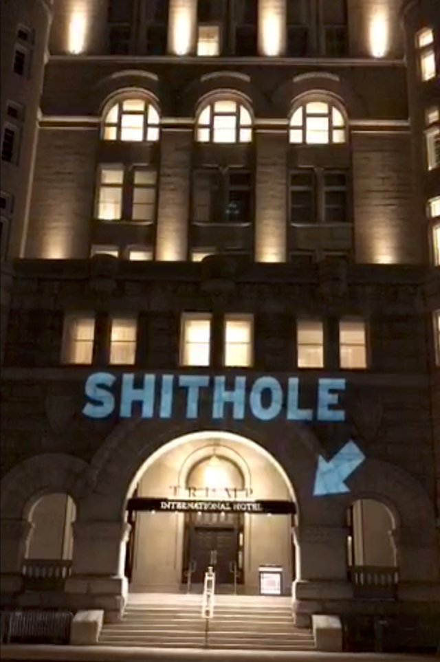A projection is seen on the Trump International Hotel in Washington, U.S., January 13, 2018 in still image taken from a video obtained from social media. SORANE YAMAHIRA/BELLVISUALS.COM/via REUTERS THIS IMAGE HAS BEEN SUPPLIED BY A THIRD PARTY. MANDATORY CREDIT. NO RESALES. NO ARCHIVES