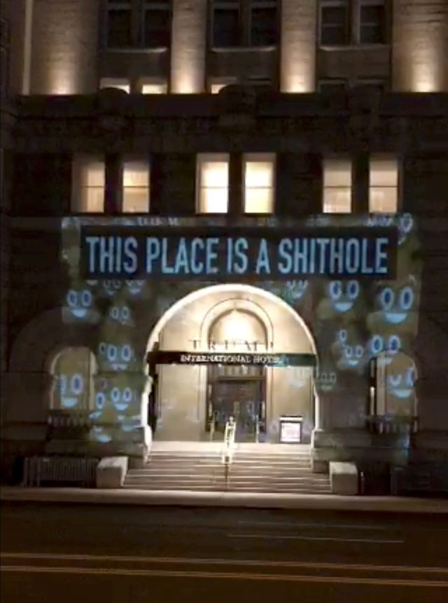 REFILE - CORRECTING TYPO A projection is seen on the Trump International Hotel in Washington, U.S., January 13, 2018 in this still image taken from a video obtained from social media. SORANE YAMAHIRA/BELLVISUALS.COM/via REUTERS THIS IMAGE HAS BEEN SUPPLIED BY A THIRD PARTY. MANDATORY CREDIT. NO RESALES. NO ARCHIVES