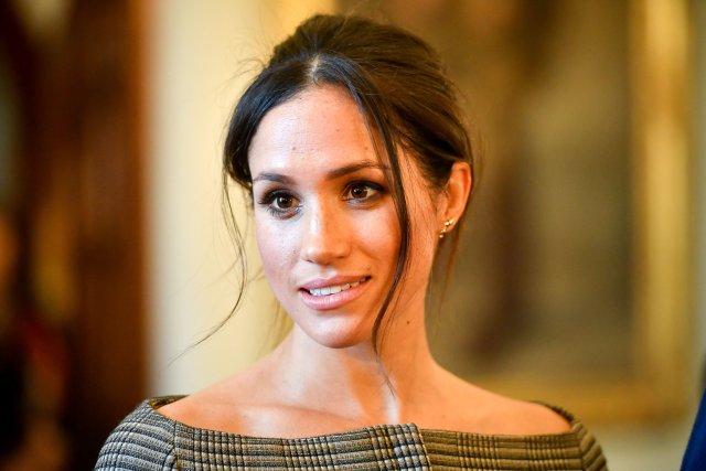 Meghan Markle chats with people inside the Drawing Room during a visit to Cardiff Castle in Cardiff, Britain, January 18, 2018. REUTERS/Ben Birchall/Pool