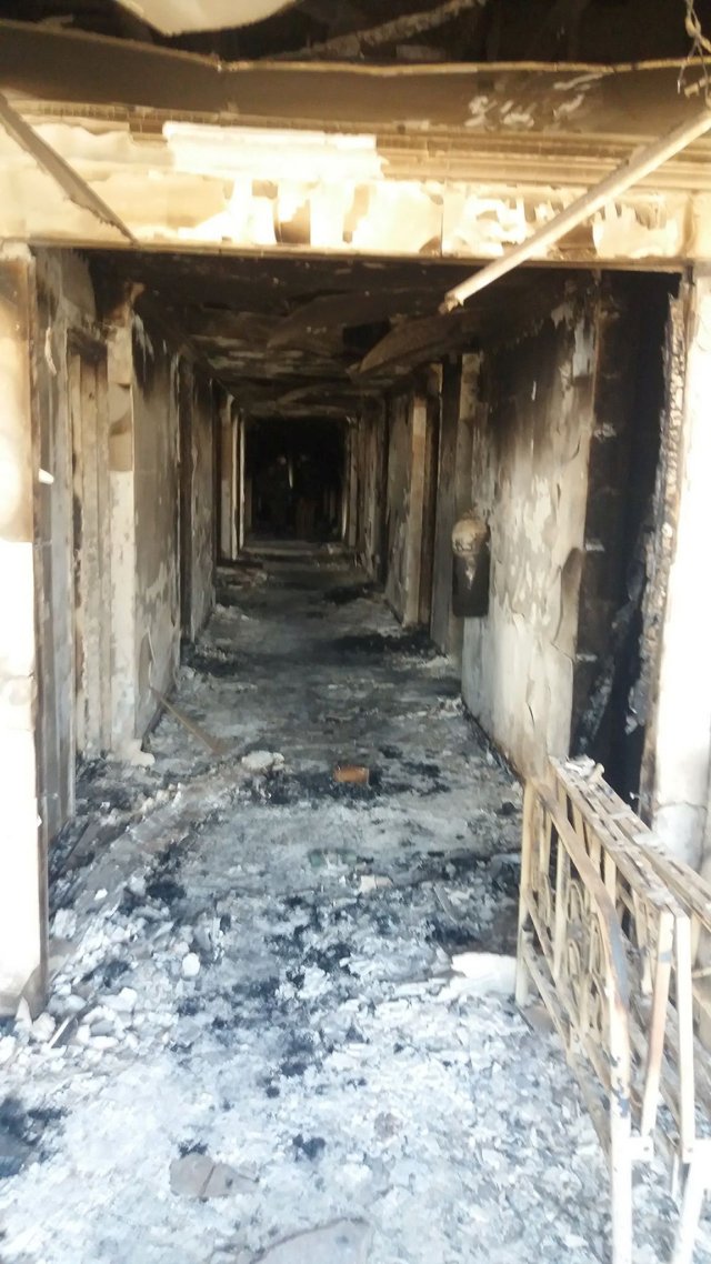 Damaged burned corridor of the Intercontinental Hotel is seen a day after an attack in Kabul, Afghanistan January 22, 2018. REUTERS/Stringer NO RESALES. NO ARCHIVES.
