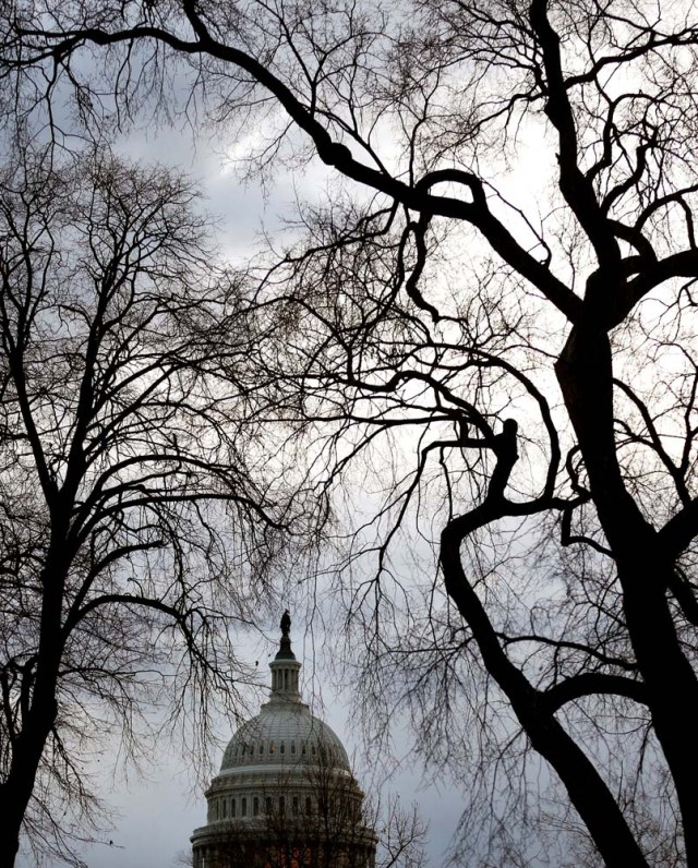 Clouds pass over the U.S. Capitol at the start of the third day of a shutdown of the federal government in Washington, U.S., January 22, 2018. REUTERS/Joshua Roberts