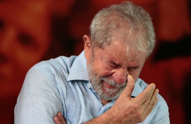Former Brazilian president Luiz Inacio Lula da Silva reacts as he attends a meeting with members of the Workers Party (PT), that decided Lula da Silva will be its candidate again in the 2018 election, despite losing an appeal against a corruption conviction that will likely bar him, in Sao Paulo, Brazil, January 25, 2018. REUTERS/Leonardo Benassatto NO RESALES. NO ARCHIVES
