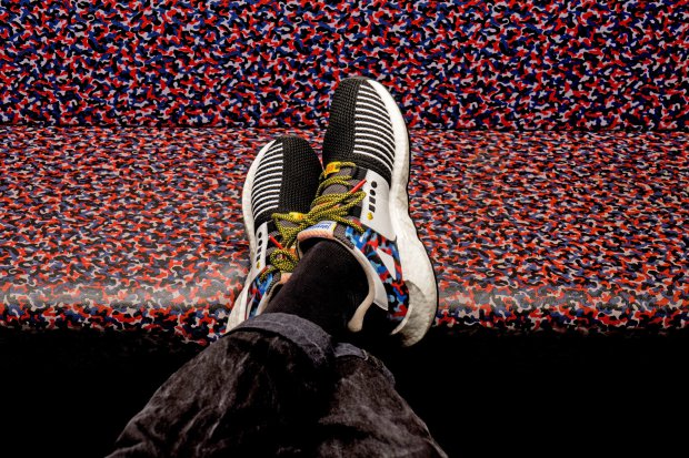 epa06427723 A handout photo made available by sports wear company adidas on 09 January 2018 shows the new sneaker model 'EQT Support 93/Berlin' with design elements of the grafitti covering pattern of Berlin's subway seat upholstery, placed on a subway seat in Berlin, Germany. According to Berlin's public transport company the bying of the BVG sneaker is combined with a one-year-ticket for Berlin's public transport network valid from 16 January to 31 December 2018. The edition of this model is limited to 500 pairs. EPA/ADIDAS HANDOUT HANDOUT EDITORIAL USE ONLY/NO SALES
