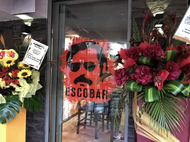 This picture taken on February 6, 2018 shows Escobar, a restaurant named after the infamous Colombian drug lord, in Singapore. The Colombian Embassy had written a three-page letter to Singapore?s foreign ministry to express ?serious concern? over the restaurant, which it says is named after the worst criminal in Colombia?s history.  / AFP PHOTO / Elizabeth LAW