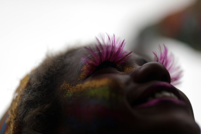 A reveller takes part in the annual block party Escravos da Maua as part of pre-carnival festivities in Rio de Janeiro, Brazil, February 4, 2018. Picture taken February 4, 2018. REUTERS/Ricardo Moraes