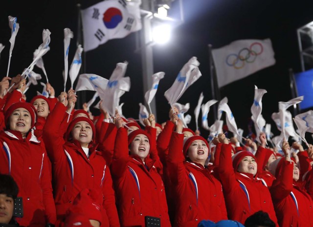 Pyeongchang 2018 Winter Olympics – Opening ceremony – Pyeongchang Olympic Stadium- Pyeongchang, South Korea – February 9, 2018 - Cheerleaders of North Korea await the start of the opening ceremony. REUTERS/Eric Gaillard