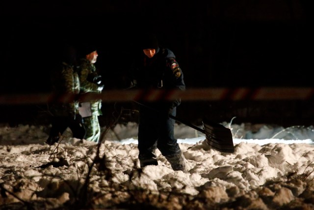 Emergency services work at the scene where a Saratov Airlines Antonov AN-148 plane crashed after taking off from Moscow's Domodedovo airport, outside Moscow, Russia February 11, 2018. REUTERS/Sergei Karpukhin