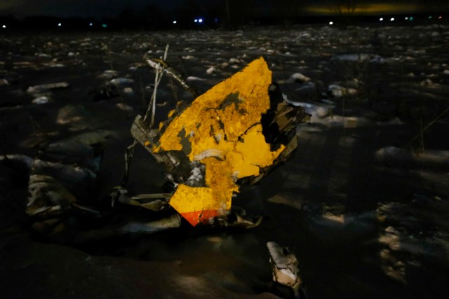 A part of a Saratov Airlines Antonov AN-148 plane that crashed after taking off from Moscow's Domodedovo airport, is seen at the scene of the incident outside Moscow, Russia February 11, 2018. REUTERS/Sergei Karpukhin
