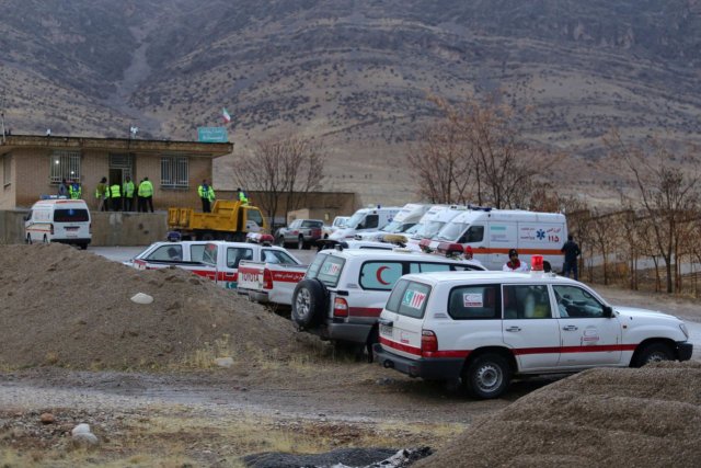 Ambulances and vehicles are seen following a plane crash near the town of Semirom, Iran, February 18, 2017. REUTERS/Tasnim News Agency ATTENTION EDITORS - THIS PICTURE WAS PROVIDED BY A THIRD PARTY.