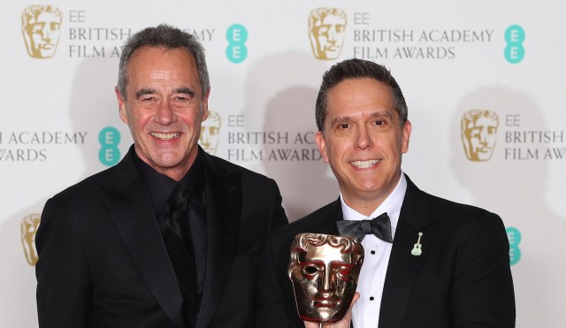 Jim Morris and Lee Unkrich, hold their awards for  Best Animated Film award for 'Coco' at the British Academy of Film and Television Awards (BAFTA) at the Royal Albert Hall in London, Britain February 18, 2018. REUTERS/Hannah McKay