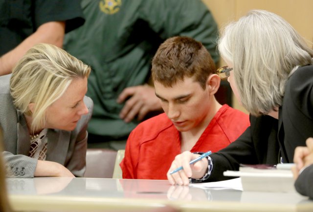 Nikolas Cruz, facing 17 charges of premeditated murder in the mass shooting at Marjory Stoneman Douglas High School in Parkland, appears in court for a status hearing in Fort Lauderdale, Florida, U.S. February 19, 2018.   REUTERS/Mike Stocker/Pool
