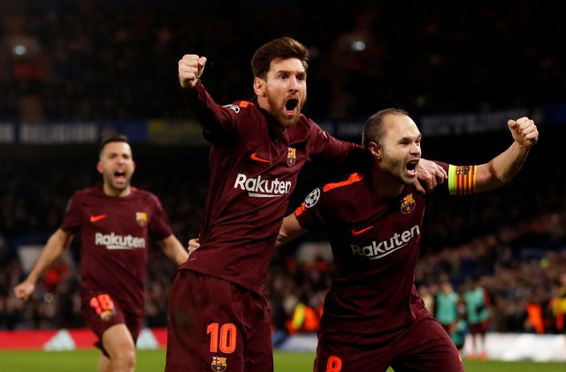 Soccer Football - Champions League Round of 16 First Leg - Chelsea vs FC Barcelona - Stamford Bridge, London, Britain - February 20, 2018   Barcelona’s Lionel Messi celebrates scoring their first goal with Andres Iniesta                                Action Images via Reuters/Andrew Boyers     TPX IMAGES OF THE DAY