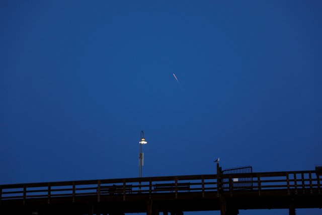 The SpaceX Falcon 9 rocket carrying a PAZ Earth Observation satellite is launched from Vandenberg Air Force Base (AFB) as seen over the Ventura Pier in Ventura, California, U.S., February 22, 2018. REUTERS/Patrick T. Fallon
