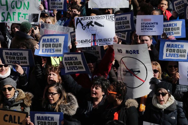 Participants take part in the March for Our Lives Rally in New York on March 24, 2018. Galvanized by a massacre at a Florida high school, hundreds of thousands of Americans are expected to take to the streets in cities across the United States on Saturday in the biggest protest for gun control in a generation. / AFP PHOTO / Eduardo MUNOZ ALVAREZ
