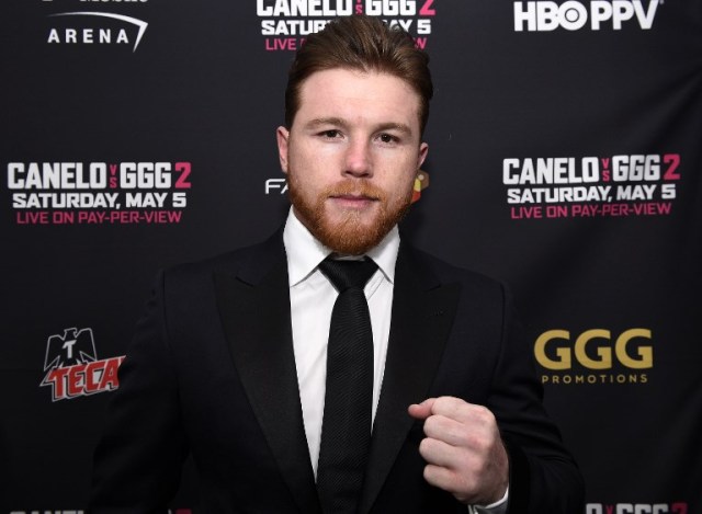 LOS ANGELES, CA - FEBRUARY 27: Boxer Canelo Alvarez poses during a news conference at Microsoft Theater at L.A. Live to announce the upcoming rematch against Gennady Golovkin on February 27, 2018 in Los Angeles, California.   Kevork Djansezian/Getty Images/AFP