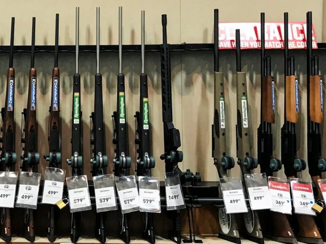 Guns for sale are seen inside of Dick's Sporting Goods store in Stroudsburg, Pennsylvania, U.S., February 28, 2018. REUTERS/Eduardo Munoz