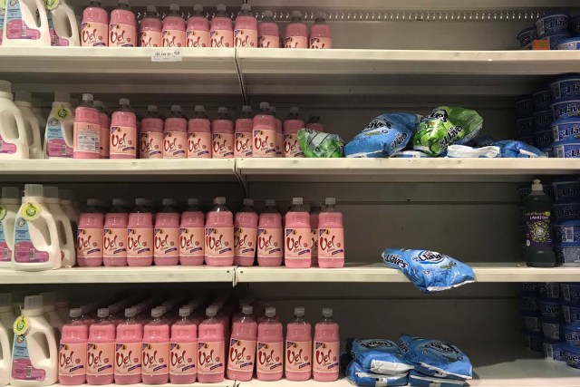 Containers of laundry detergent Vel Rosa produced by Colgate-Palmolive Co are seen on a shelf at a supermarket in Caracas, Venezuela March 7, 2018. Picture taken March 7, 2018. REUTERS/Marco Bello