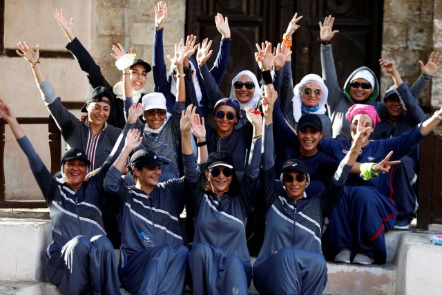 Women cheer during a running event marking International Women's Day in Old Jeddah, Saudi Arabia March 8, 2018. REUTERS/Faisal Al Nasser