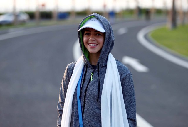 Saudi woman Hala al-Dakheel poses for a photo during a running event marking International Women's Day in Jeddah, Saudi Arabia March 8, 2018. "We did something so fun for the first time. It is so amazing to be a woman and to have all this power and to be able to do what we want and what we love," she said. REUTERS/Faisal Al Nasser